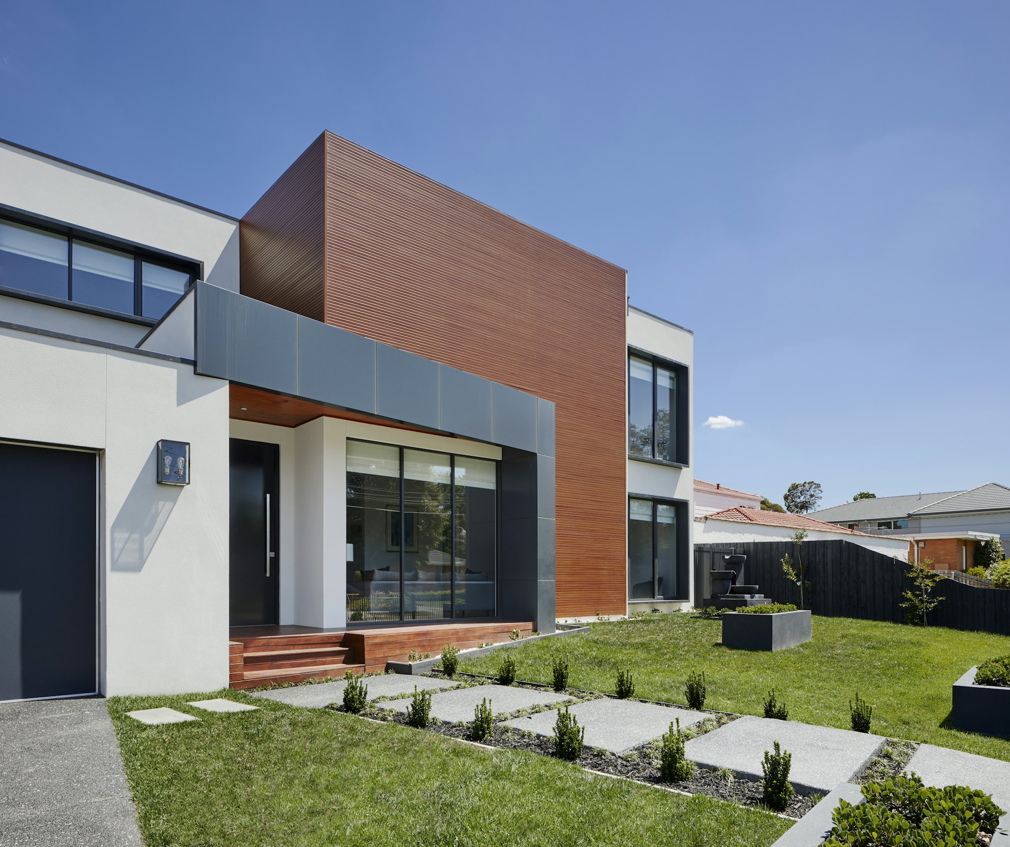 Façade contemporaine bois et enduit